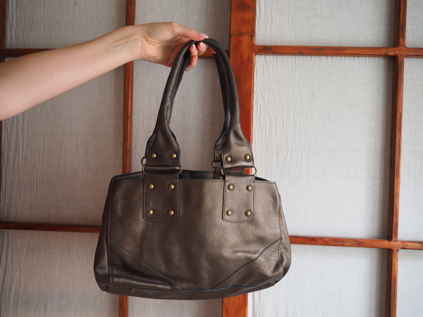 lædertaske i unik kobberfarve