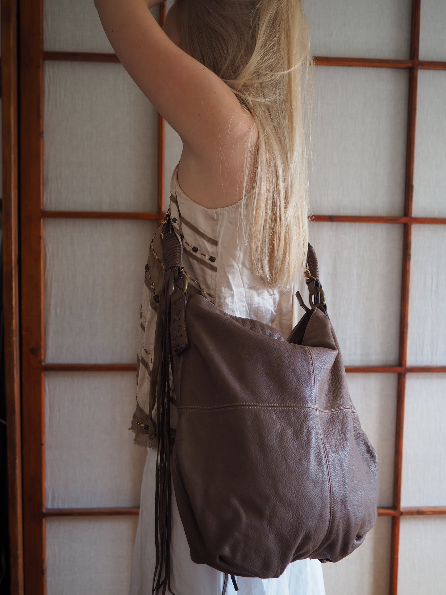 rummelig crossbody-lædertaske
