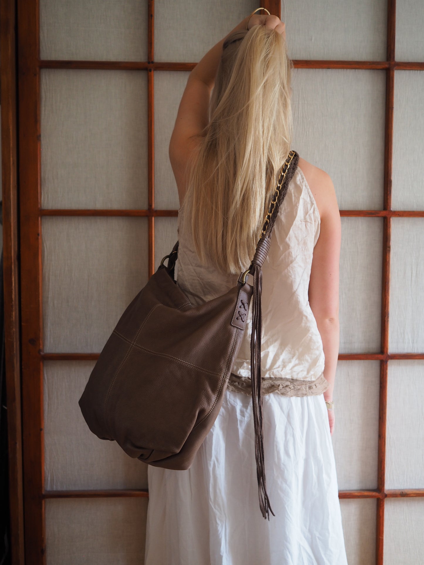 rummelig crossbody-lædertaske