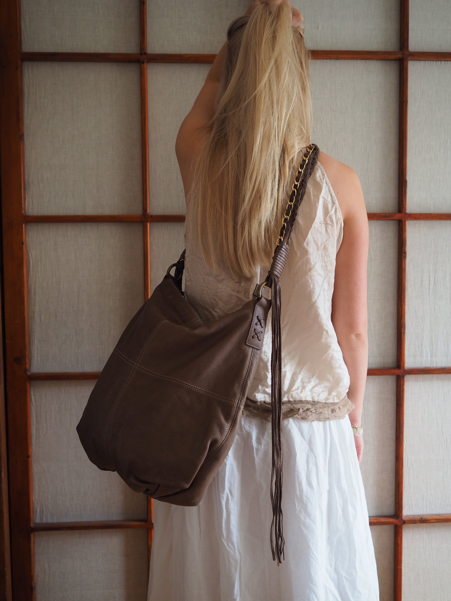 rummelig crossbody-lædertaske