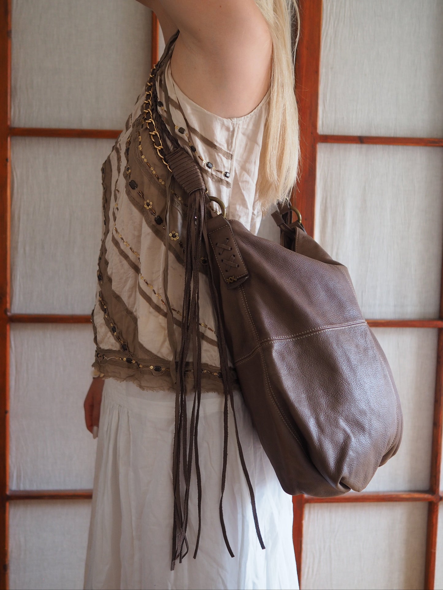 rummelig crossbody-lædertaske